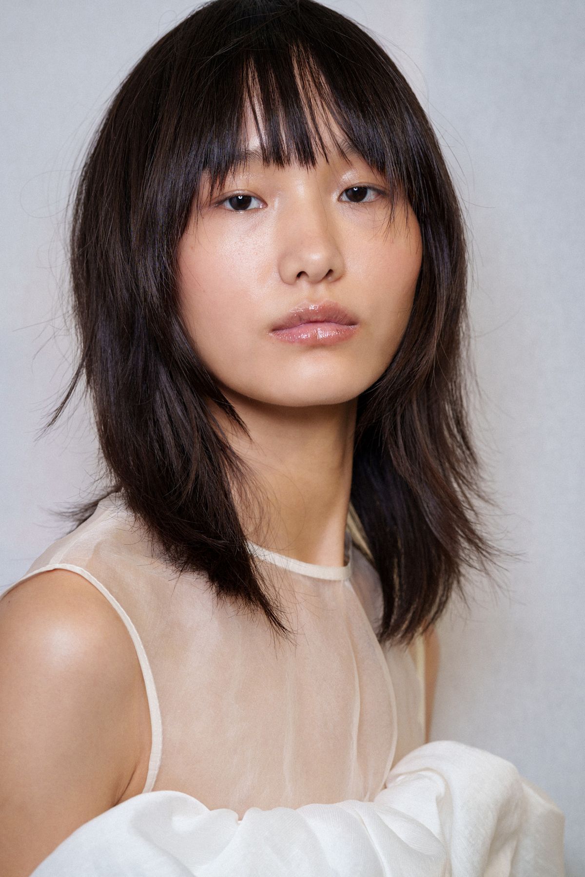 Close-up photo showing healthy, glossy under-sheen skin expression