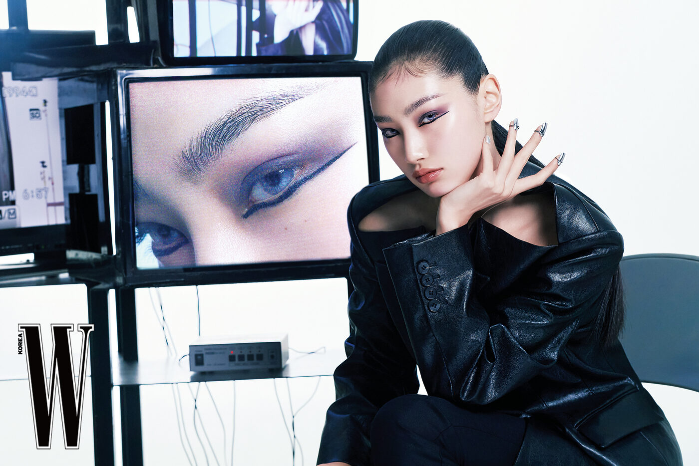 A person receiving a makeup tutorial and displayed beauty products