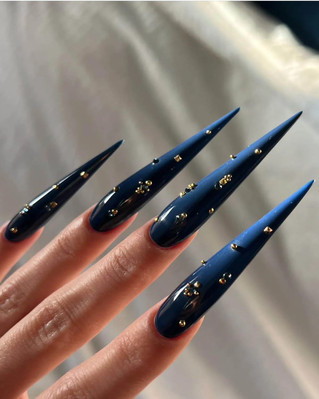 Detailed close-up photos of 3D nail designs
