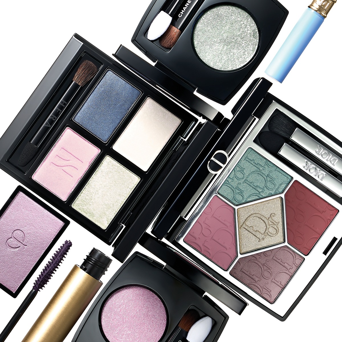 A style cut featuring various metallic-color eyeshadows and glow products