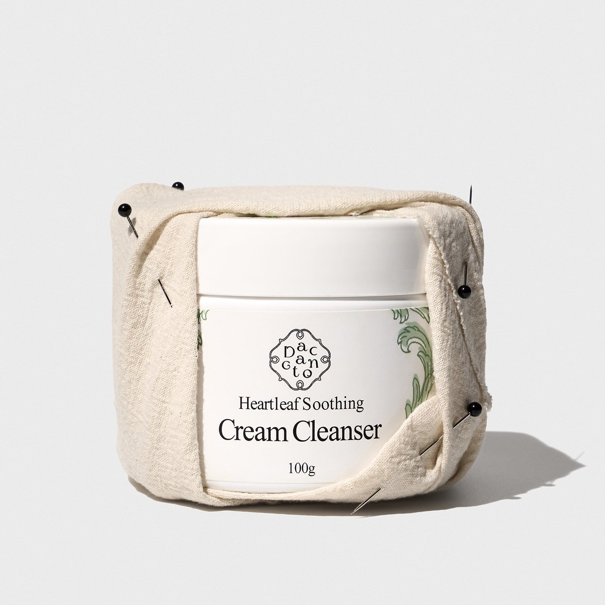 Beauty products with natural clinic ingredients and wrapped in clean linen