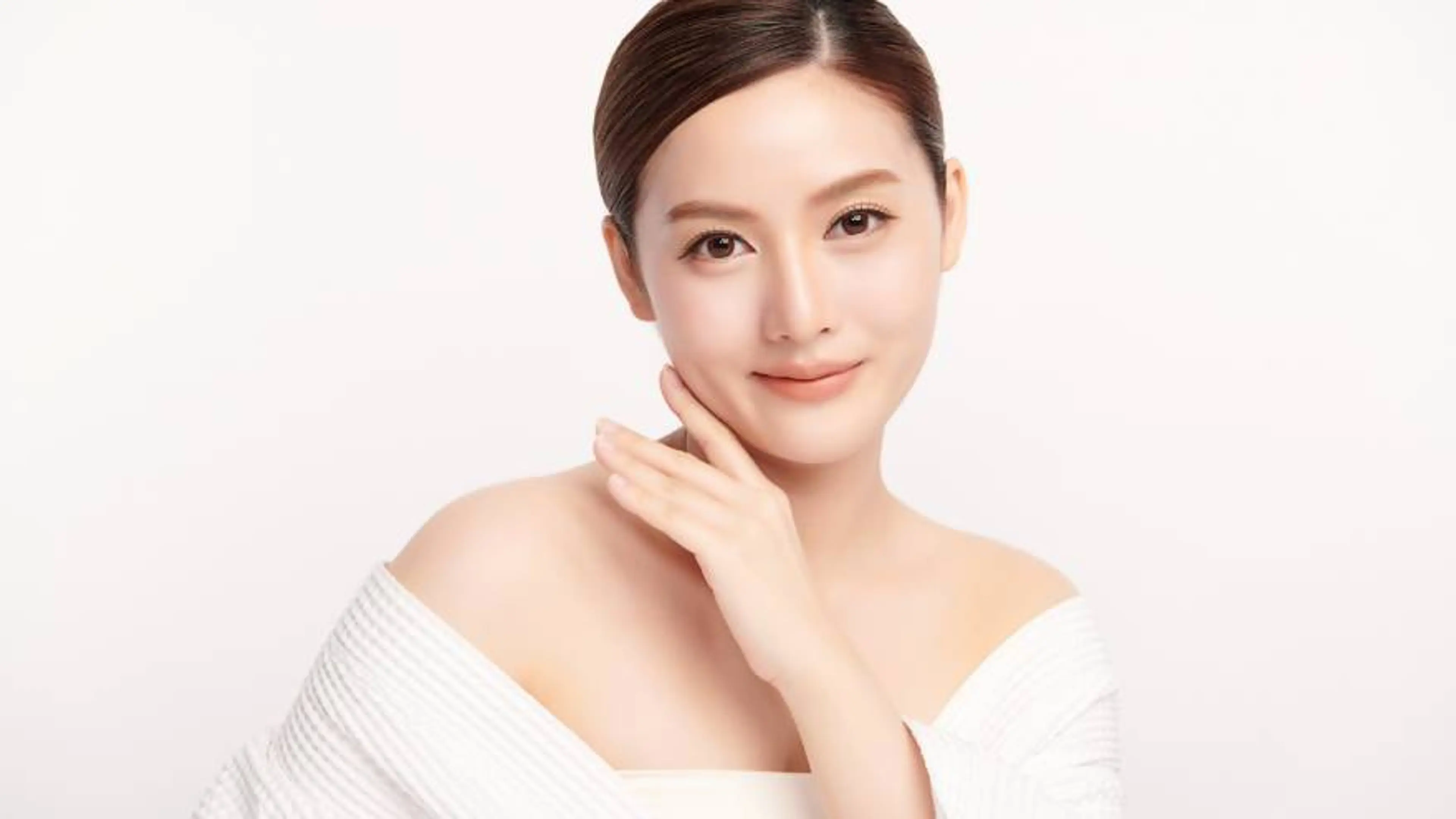 A woman's face with a bright, transparent complexion