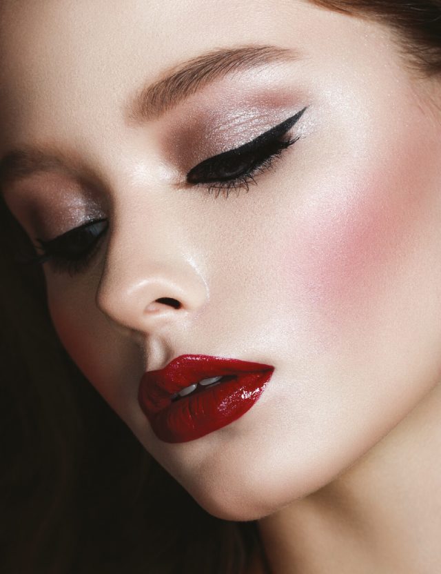 A finished-face image with detailed kid makeup and glow makeup
