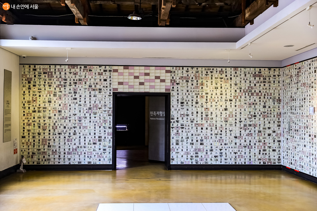 The inmate record cards of independence activists displayed in the National Resistance Hall show the prisoners' faces and records.