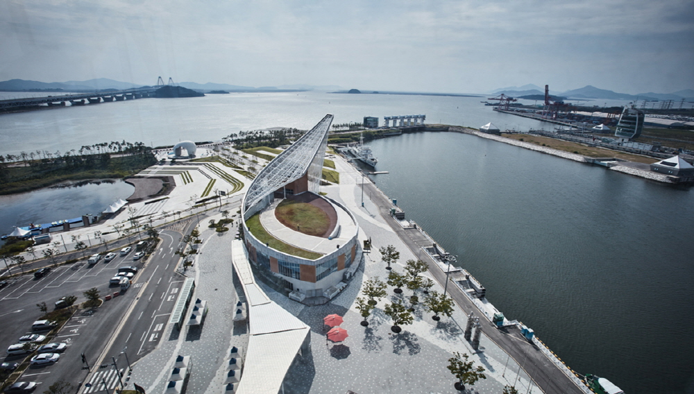 Aramaru Observatory with the Ara Waterway Flowing Beneath Its Glass Floor